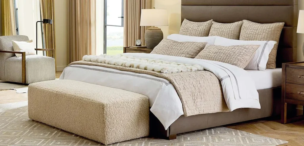 Place a bench, ottoman, or chaise at the foot of the bed. 