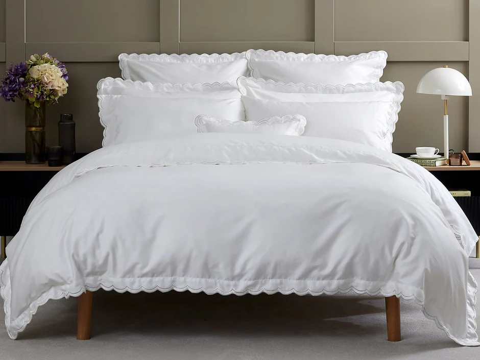 Add a ruffled or scalloped duvet cover