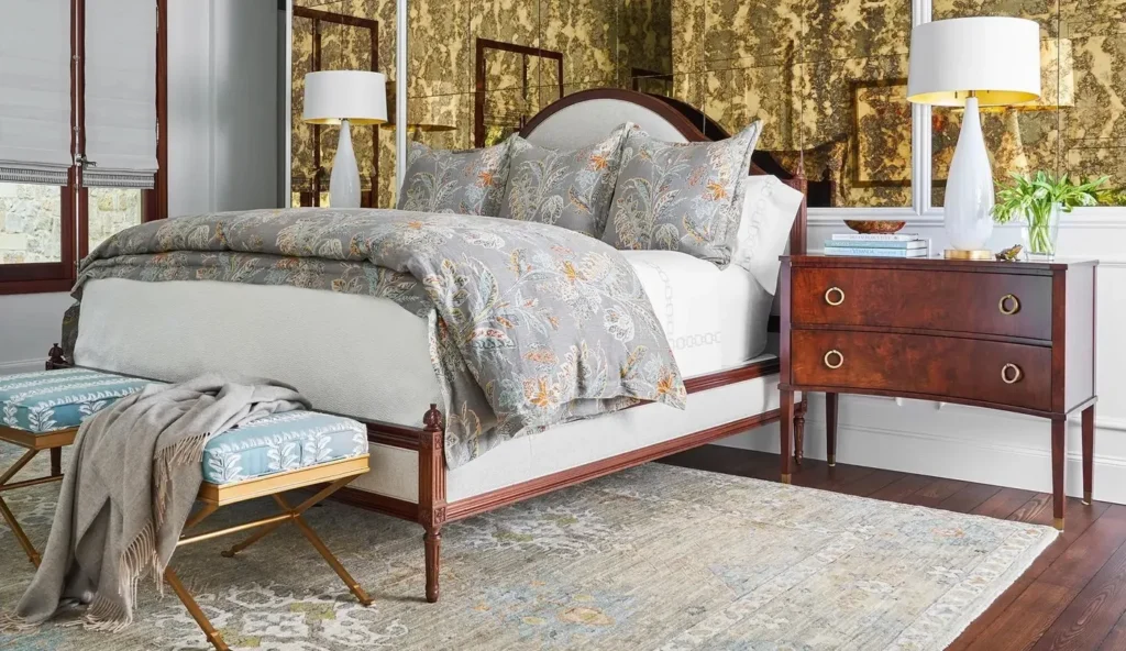 Add a vintage or cane bench at the foot of the bed. 