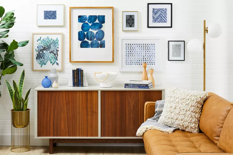 Make a small gallery wall of mixed frames. 