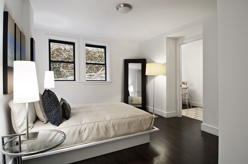 Use a tall floor mirror, leaned in your darkest corner