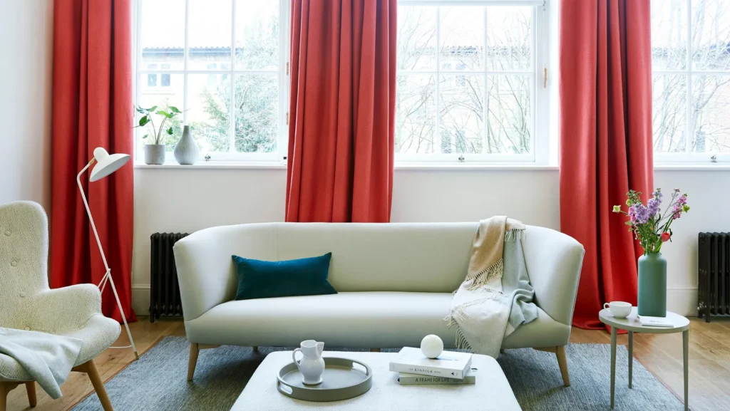 Hang heavy textured curtains in linen or cotton. 